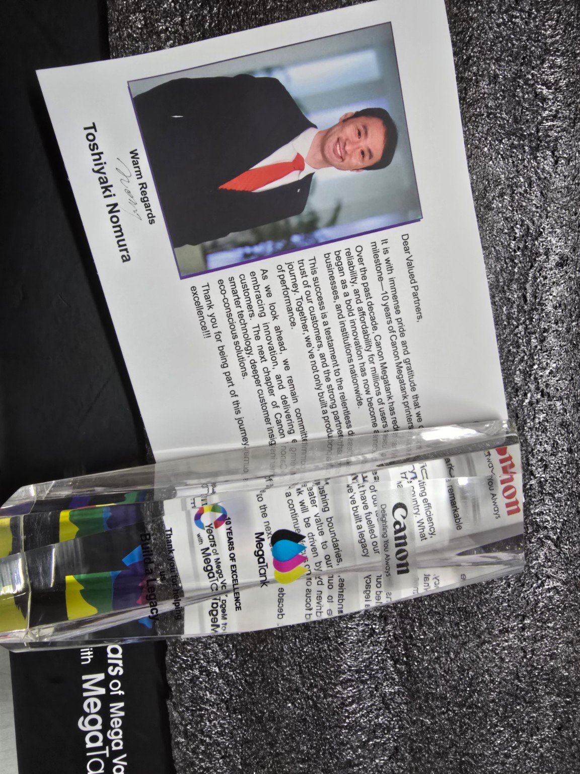 Canon recognition trophy and certificate